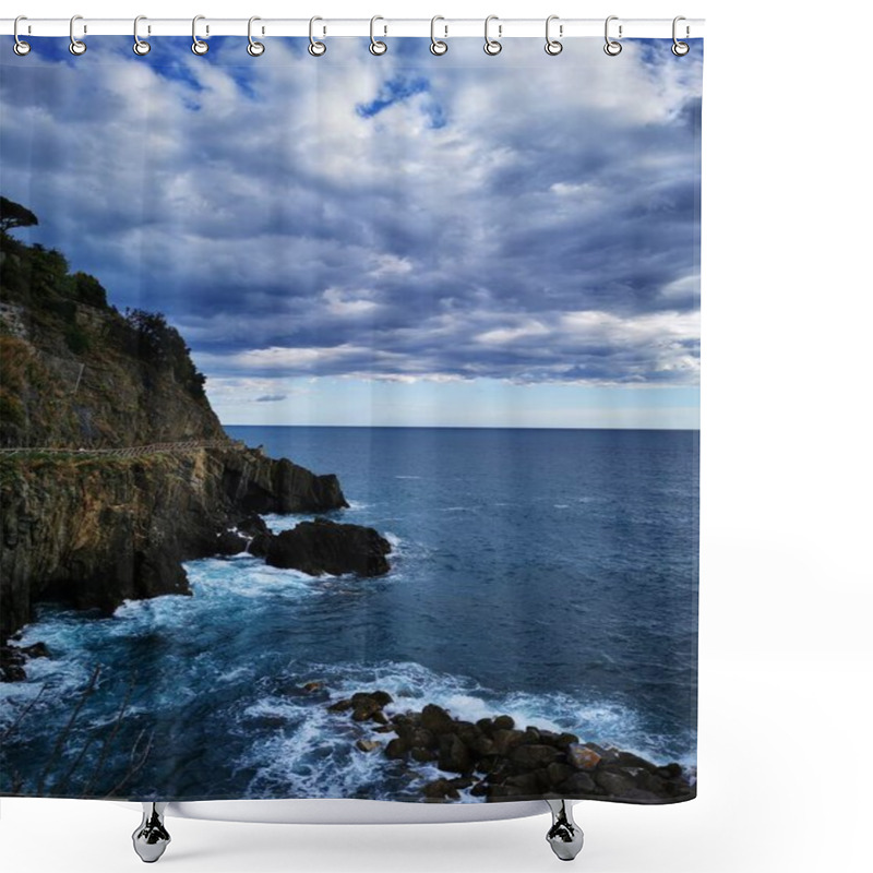 Personality  Waves Crash Against Rugged Cliffs Along A Coast, Set Beneath A Dramatic Sky Filled With Clouds. The Scene Captures The Beauty Of Nature At Dusk. Shower Curtains