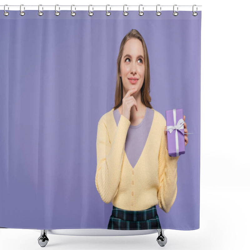 Personality  Pensive Young Woman Holding Wrapped Gift Box Isolated On Purple Shower Curtains