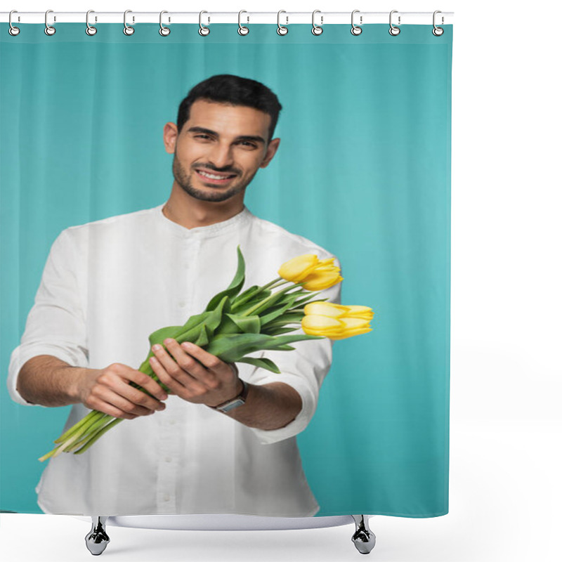 Personality  Yellow Tulips In Hands Of Smiling Arabian Man On Blurred Background Isolated On Blue  Shower Curtains