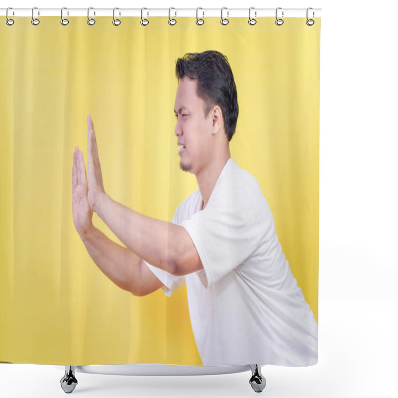 Personality  An Asian Man Gestures To Stop Or Push With His Hand On A Bright Yellow Background. Shower Curtains