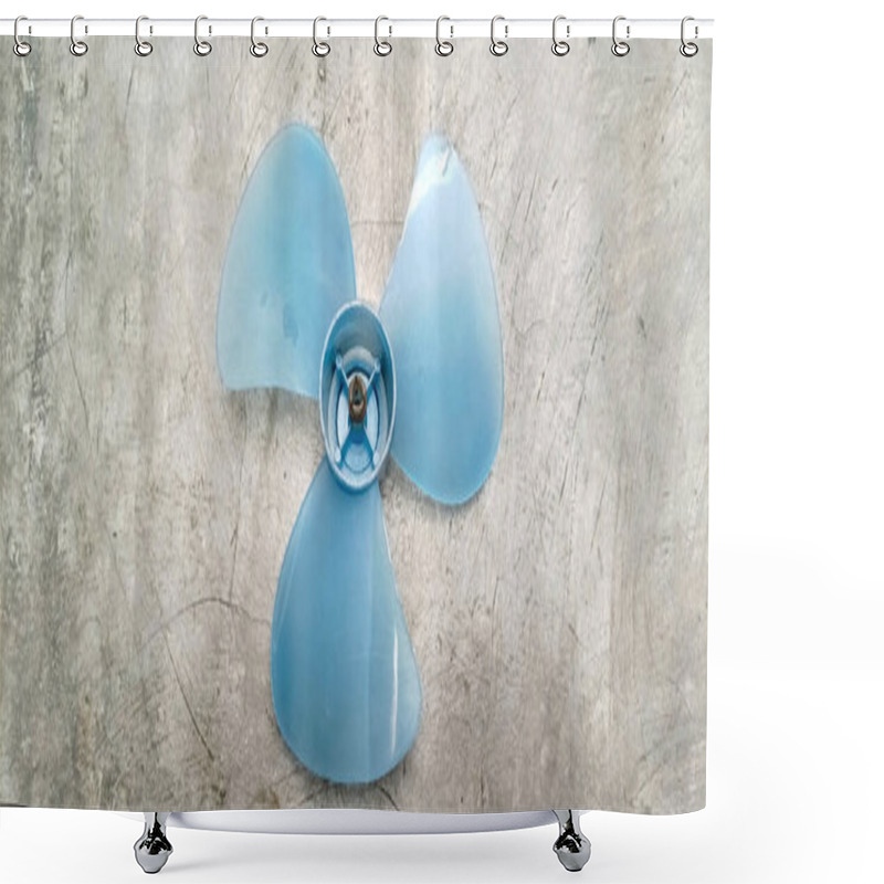 Personality  A Closeup Of A Blue Plastic Fan Blade. The Blade Is Designed To Circulate Air And Cool Down A Room. Shower Curtains