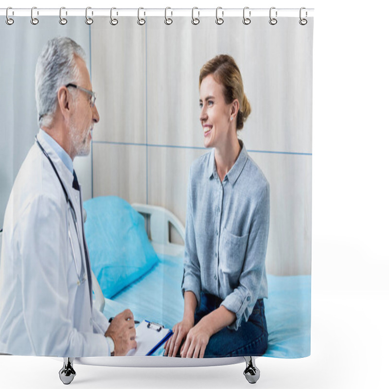 Personality  Happy Mature Male Doctor Writing In Clipboard Near Female Patient In Hospital Room Shower Curtains