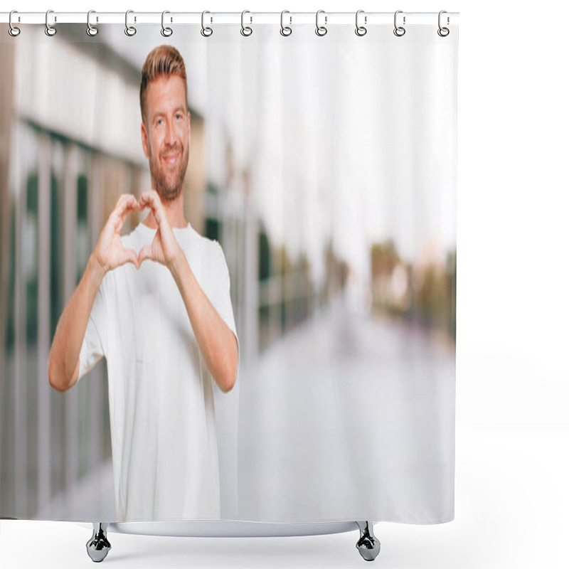 Personality  Young Blonde Man Standing Sideways, Smiling, Looking Happy And In Love, Making The Shape Of A Heart With Hands. Side Or Lateral View. Shower Curtains