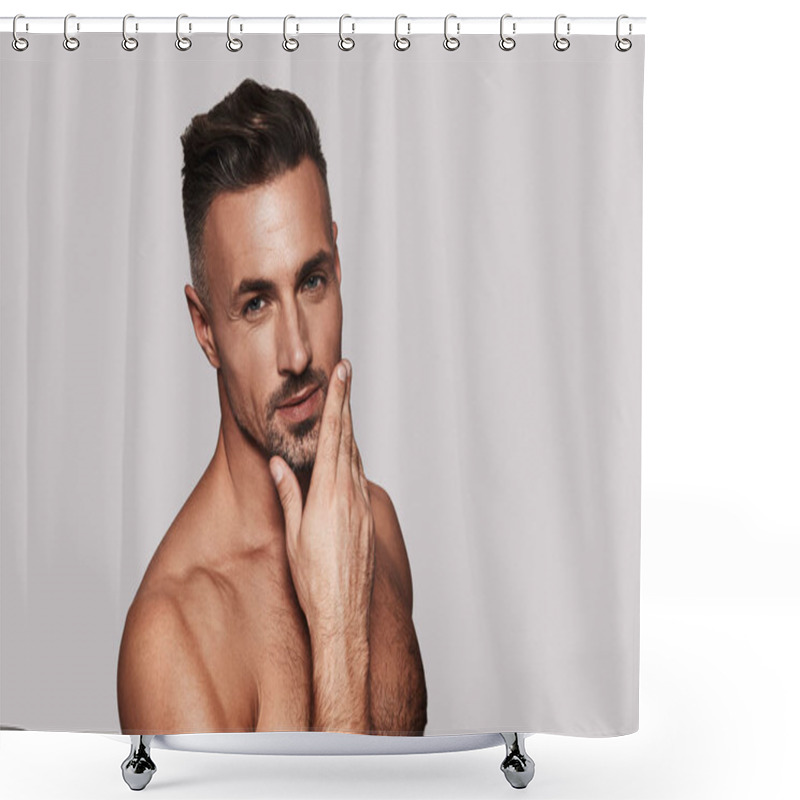 Personality  Handsome Man Keeping Hand On Chin And Looking At Camera While Standing Against Grey Background Shower Curtains