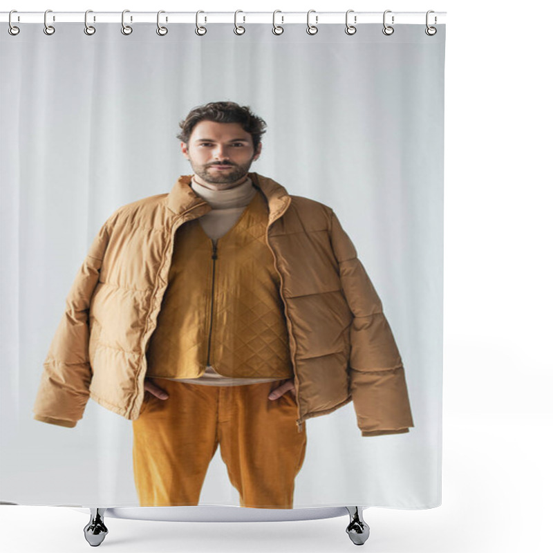 Personality  Man In Warm Puffer Jacket And Vest Standing With Hands In Pockets Of Yellow Trousers Isolated On Grey Shower Curtains