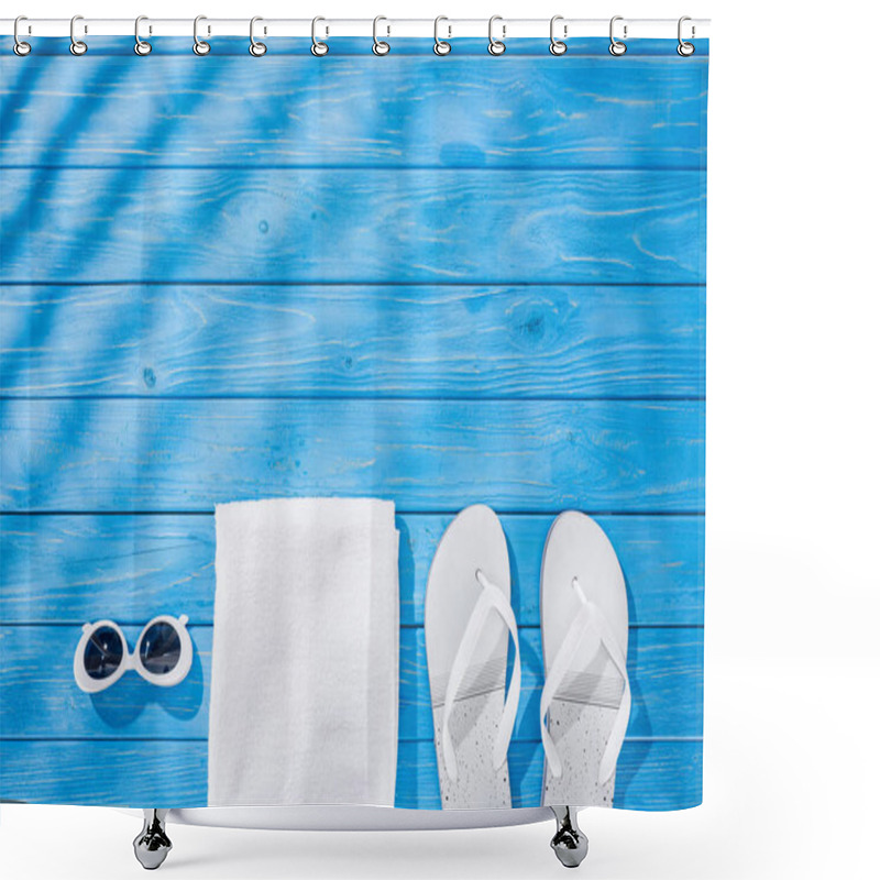 Personality  Top View Of White Folded Towel, Retro Sunglasses And Flip Flops On Blue Wooden Background With Shadows And Copy Space Shower Curtains