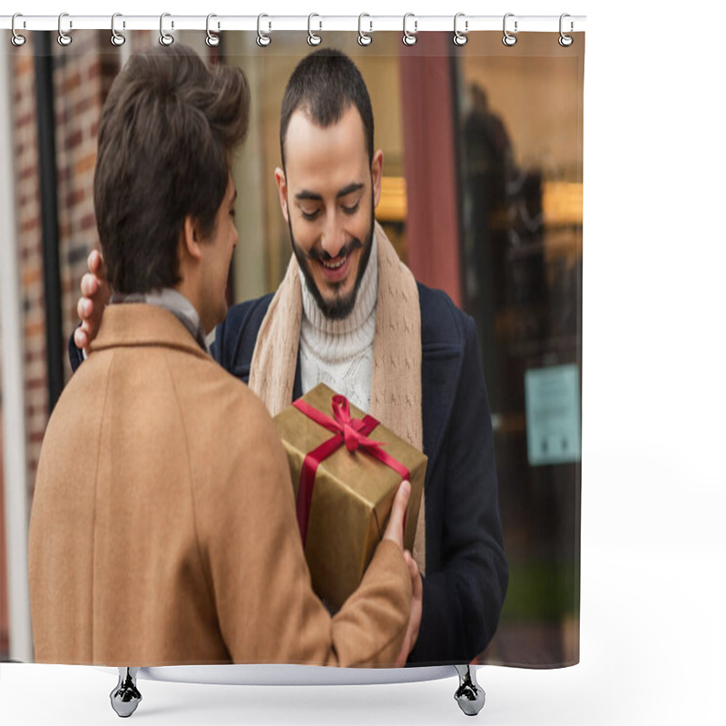 Personality  Young Man Holding Christmas Present Near Happy Bearded Gay Partner On City Street Shower Curtains