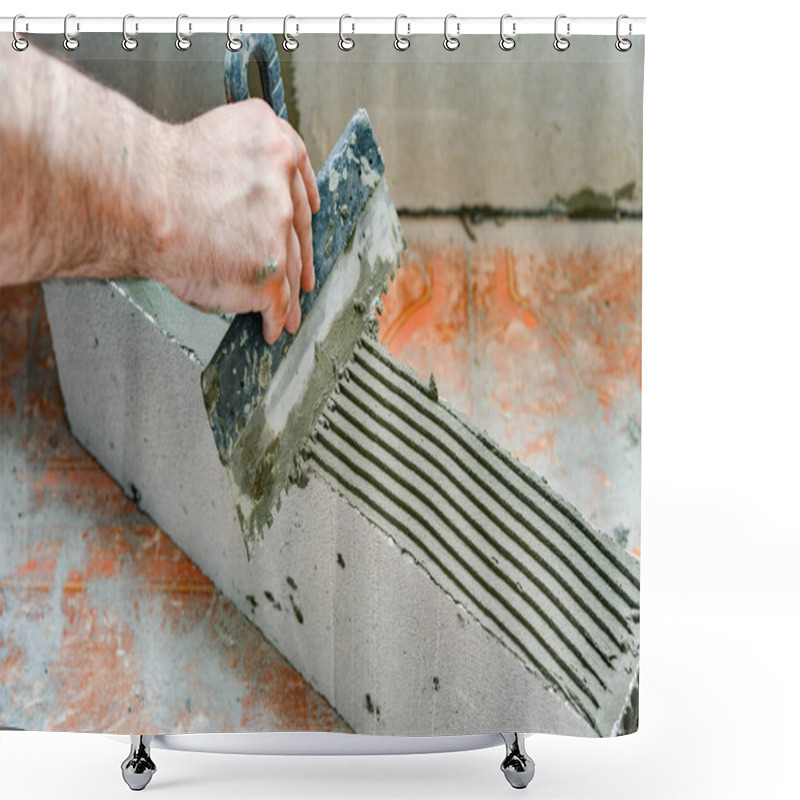 Personality  A Worker Applies Adhesive Mortar To A Wall Block In A Private House. Foam Masonry, Repair And Construction Shower Curtains